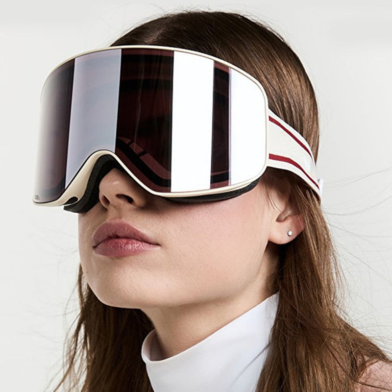 Person wearing futuristic goggles with a white background