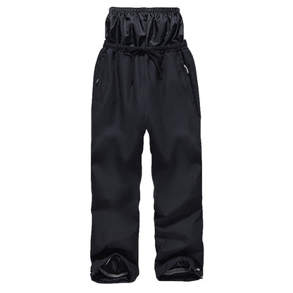 Black snow pants on a white background