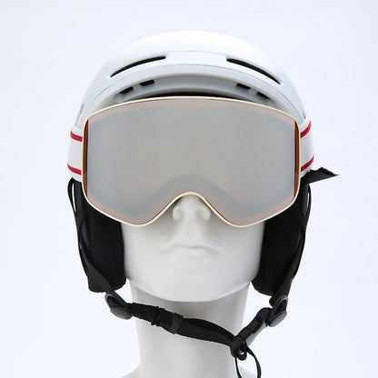 White helmet with goggles on a mannequin head against a white background