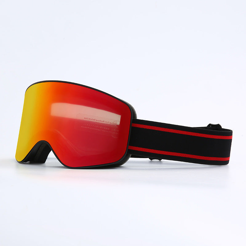 Red and black ski goggles on a white background