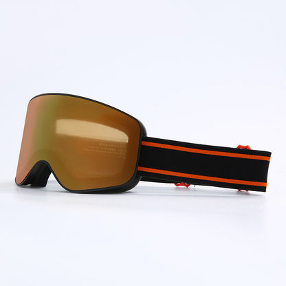 Ski goggles with orange lens and black frame on a white background
