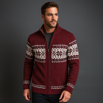 Man wearing a red christmas sweater with white patterns on a gray background