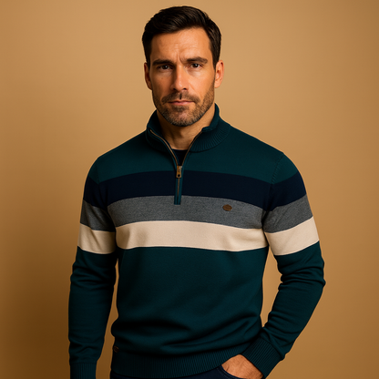 Man wearing a striped sweater against a beige background