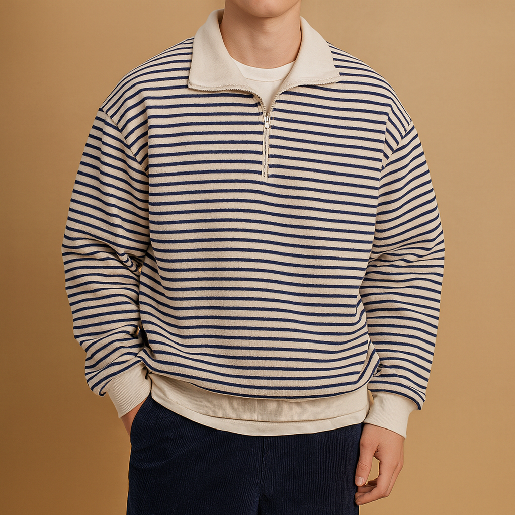 Person wearing a striped sweater with a brown background