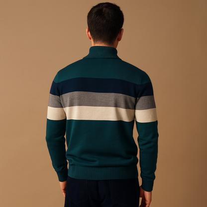 Person wearing a green striped sweater against a brown background